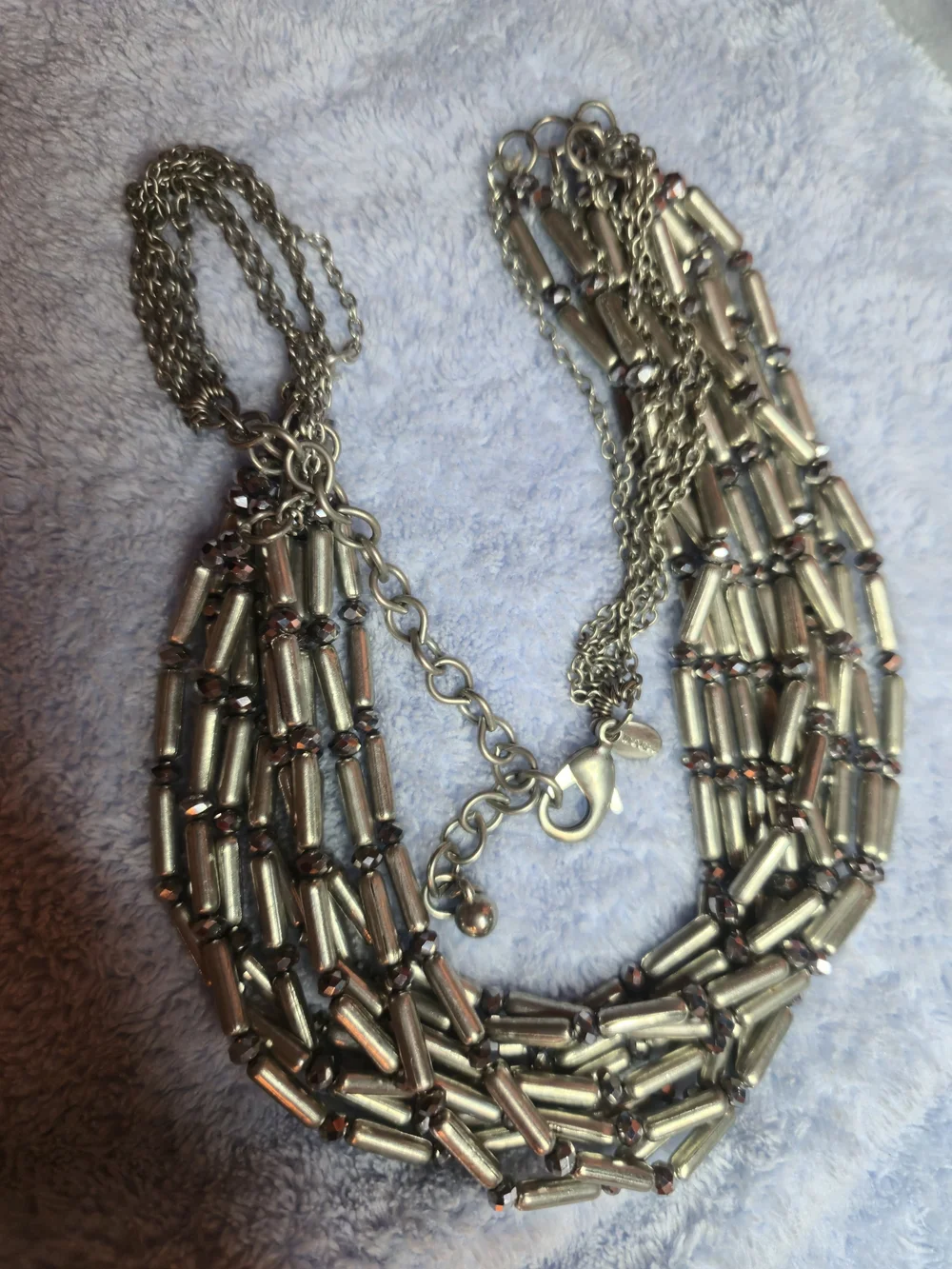 multi-strand statement necklace by Chico's features layered silver-tone tube